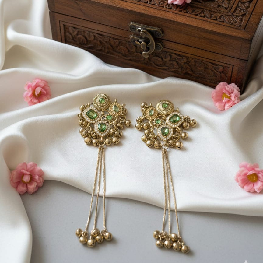 Zareen Emerald Kundan Tassel Earrings