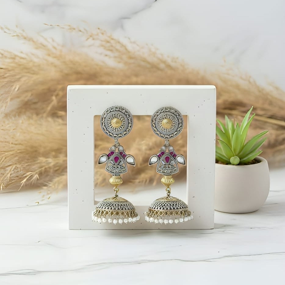 Temple Design Oxidised Jhumka Earrings with Red Kundan Stones